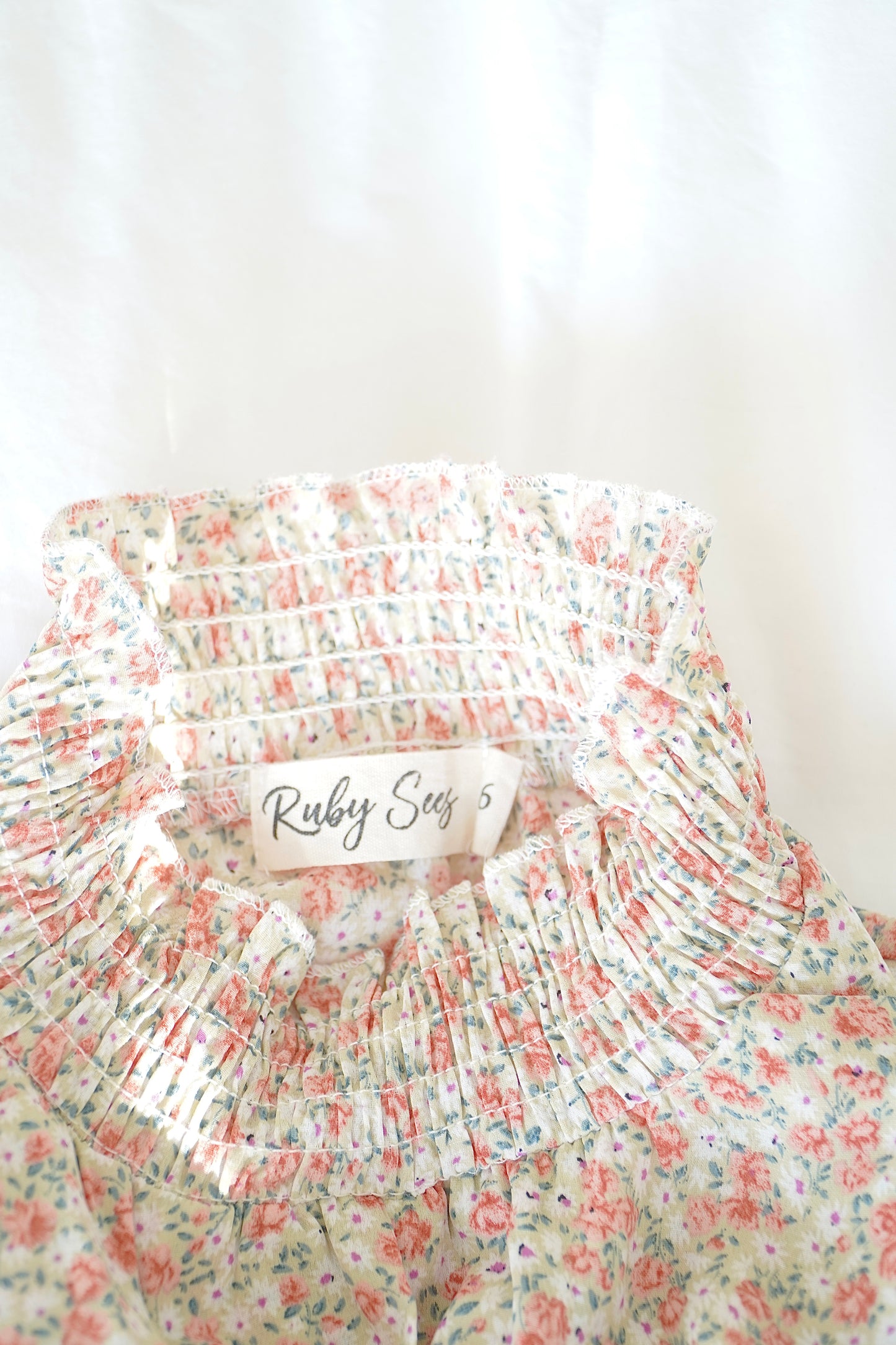 Ruby Sees Floral Smocked High neck mini dress (6 Au)
